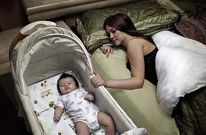 Image of a mother and child sharing a room