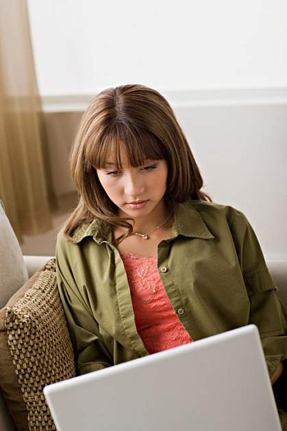 young woman at her computer