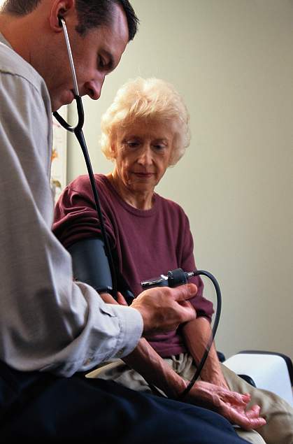 elderly woman with doctor