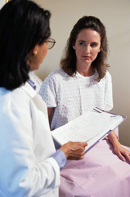 A woman talking with her doctor