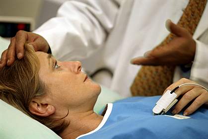 Picture of female patient lying in a hospital bed