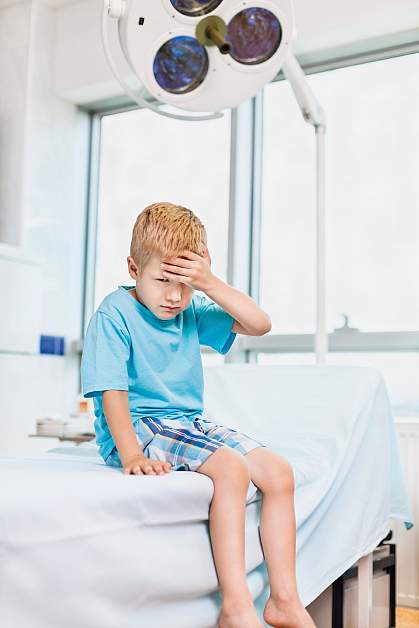 Photo of a young boy at the doctor