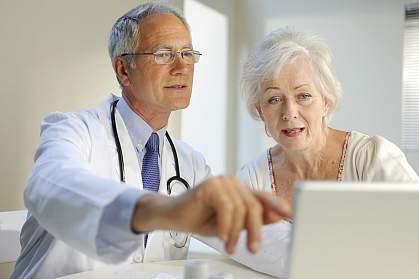 Doctor consulting with patient