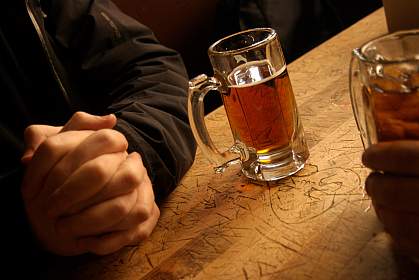 Picture of a mug of beer sitting on a bar
