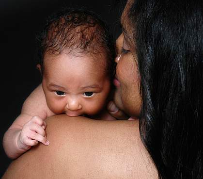 Photo of a mother of African descent with her infant