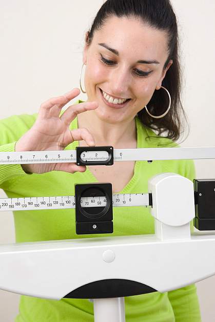 Photo of woman on a scale