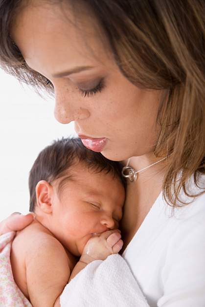 Photo of a woman holding an infant