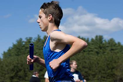 photo of a teenage boy running