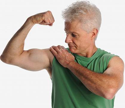 Photo of an older man flexing large biceps