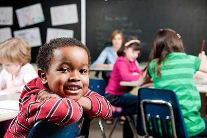 Photo of a young boy at school