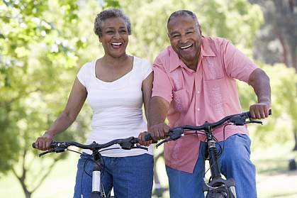 Photo of senior couple bike riding