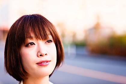 Photo of an optimistic young Japanese woman