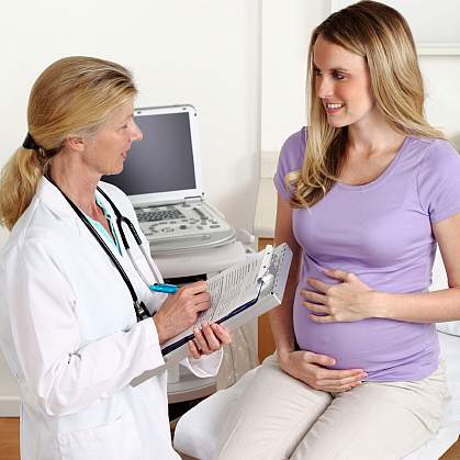 Photo of a doctor and pregnant woman