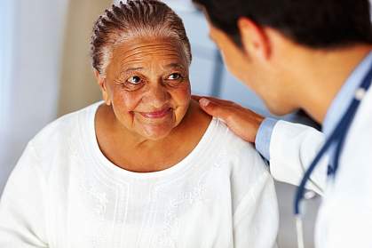 Woman listening to doctor.