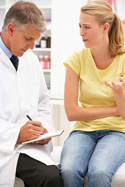 Doctor with female patient.