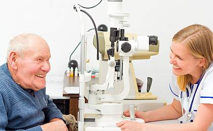 Older man getting an eye exam