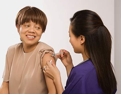 Patient receiving flu vaccine.