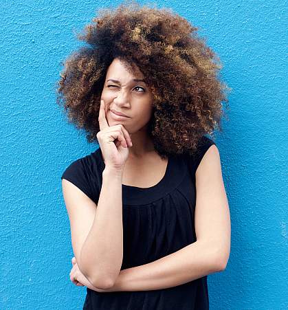 Young woman thinking.