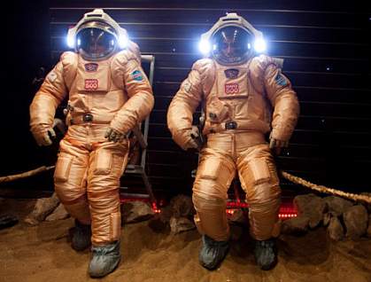 Crew members in spacesuits