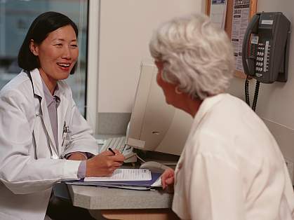 Senior woman speaking with a doctor