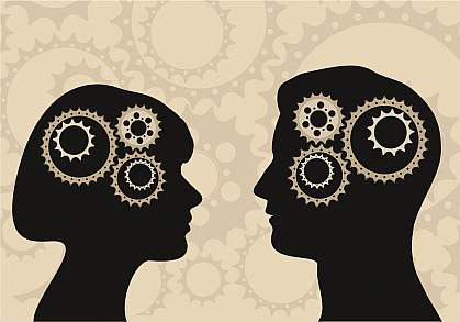 Silhouettes of a man and woman with gears in heads