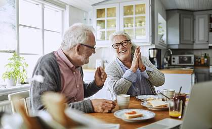 Couple finishing breakfast