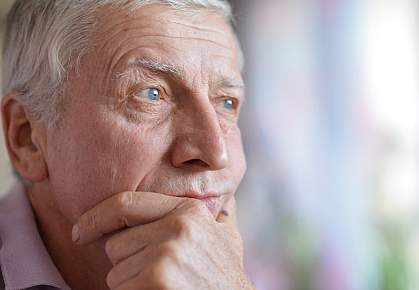 Portrait of an older man deep in thought