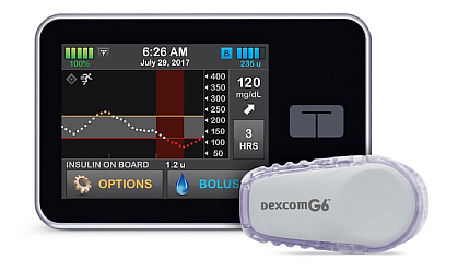 A glucose monitor with a small unit showing insulin levels.