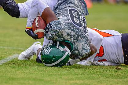 High school football player landing on his head