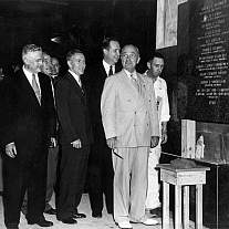 President Harry S Truman applies the first trowel of mortar to the NIH Clinical Center cornerstone.