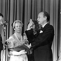Dr. Donald S. Fredrickson taking his oath of office.