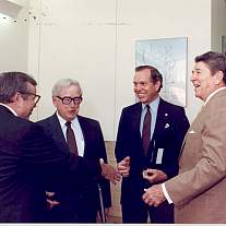 President Ronald Reagan, HHS Secretary Otis R. Bowen, Dr. James B. Wyngaarden and members of the Commission on the Human Immunodeficiency Virus Epidemic. 