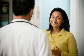 A potential volunteer talks with her doctor about participating in a clinical trial.