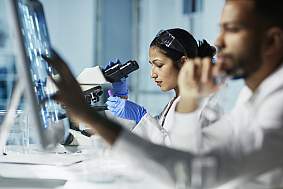 Image of two scientists in a lab