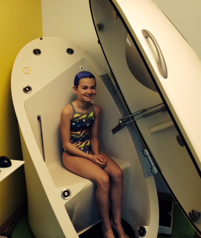A study participant in body composition measurement pod