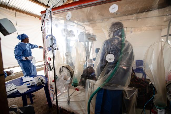 20191210-ebola.jpg Health workers caring for a patient suspected of having Ebola