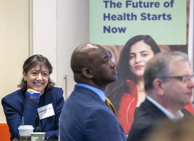 group of attendees at table
