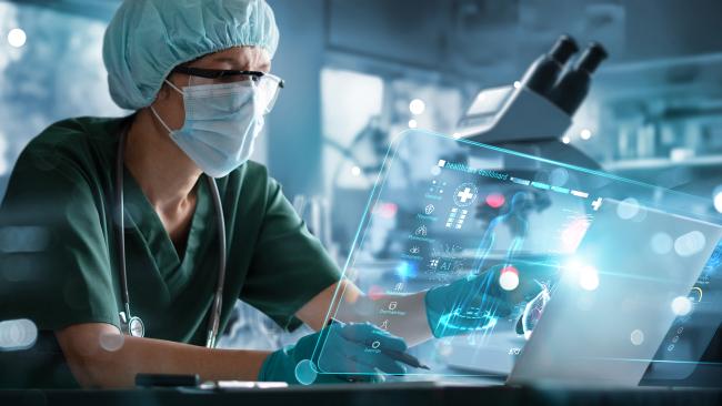 Senior female doctor medical examining and researcher uses AI algorithms analysis data developing medicine strategy in a hospital laboratory. Medical science and healthcare technology.