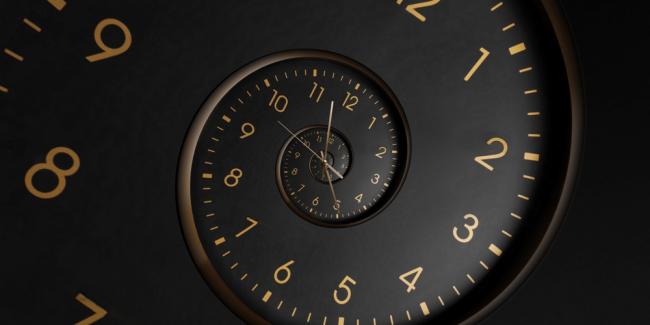 Black clockface with gold numbers, twisted in a spiral pattern.