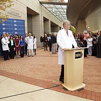 Francis Collins in front of the Clinical Center.