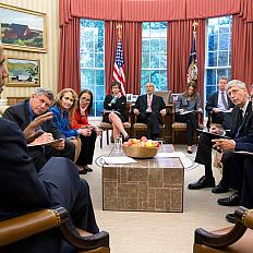 President Barack Obama holds a precision medicine meeting in the Oval Office.