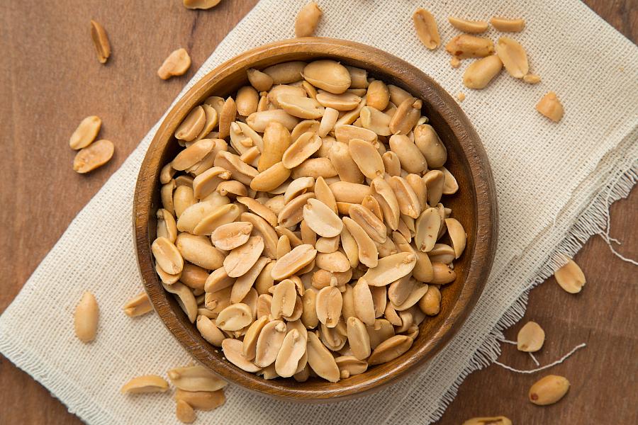 Image of a large bowl of shelled peanuts