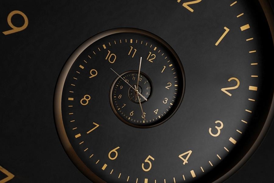 Clockface with numbers twisted in a spiral pattern.