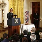 President Obama speaking at a podium