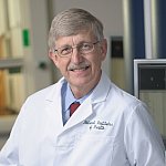 Dr. Francis Collins in a lab.