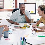 Young businesspeople having a meeting in a modern office