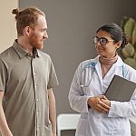A man talking to a doctor