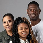 A smiling Black family