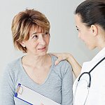 image of a woman and her doctor