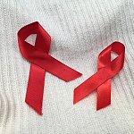 Two AIDS awareness ribbons.